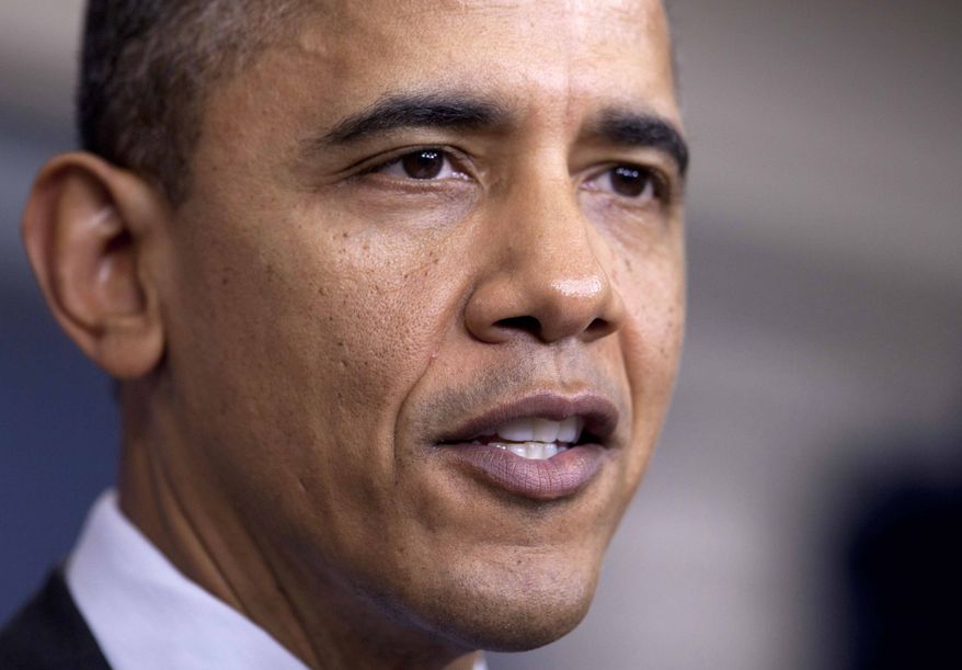 **FILE** President Obama speaks Dec. 20, 2011, in the White House. (Associated Press)