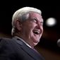 Republican presidential candidate and former House Speaker Newt Gingrich laughs Jan. 5, 2012, as he is asked a question during a campaign stop in Meredith, N.H. (Associated Press)