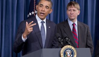 President Obama visits the new Consumer Financial Protection Bureau director Richard Cordray (right) on Jan. 6, 2012, at the CFPB&#39;s offices in Washington. (Associated Press)