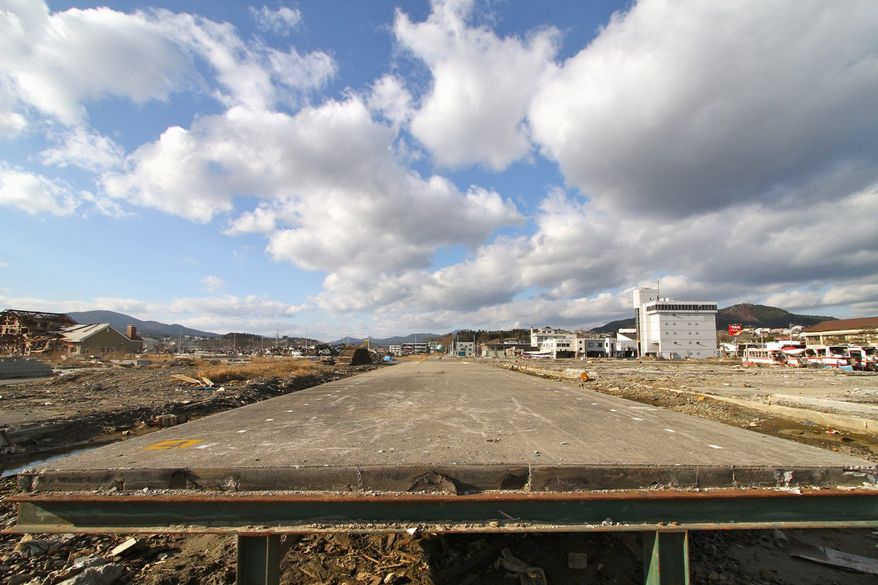 The cleaned off platform of the South Kesennuma railway station remains in the midst of the obliterated city of Kesennuma, more than nine months after the March 11 tsunami. (Christopher Johnson/Special to The Washington Times)