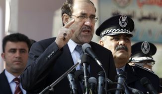 **FILE** Iraq&#39;s Prime Minister Nouri al-Maliki (center) speaks at a ceremony marking Police Day at the police academy in Baghdad on Jan. 9, 2012. (Associated Press)