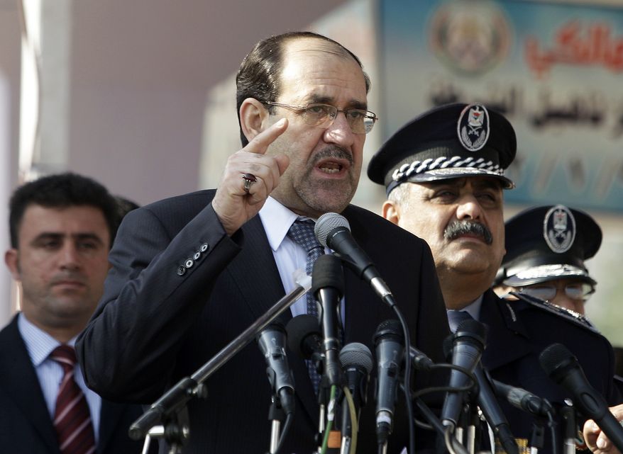 **FILE** Iraq's Prime Minister Nouri al-Maliki (center) speaks at a ceremony marking Police Day at the police academy in Baghdad on Jan. 9, 2012. (Associated Press)