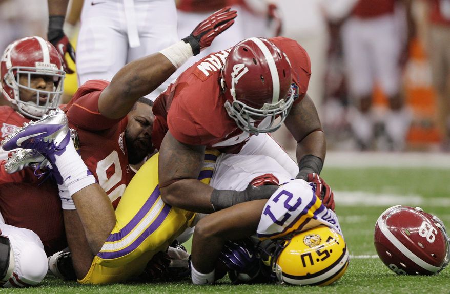 Alabama blanked LSU 21-0 in the BCS championship game, but four voting members of the media panel slotted Oklahoma State in at No.1 and one went with LSU. (Associated Press)