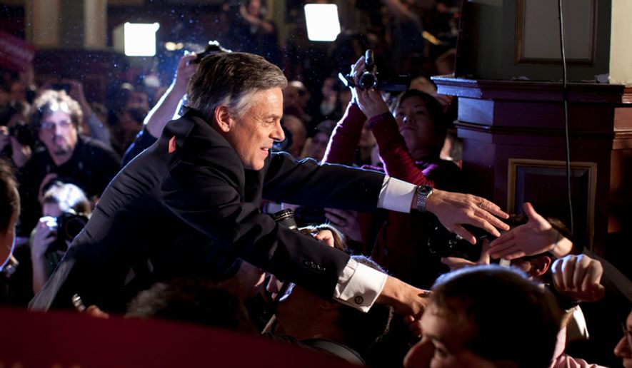Former Utah Gov. Jon Huntsman shakes hands after speaking at an primary election night rally Tuesday, Jan. 10, 2012, in Manchester, N.H.  (AP Photo/Evan Vucci) ** FILE **