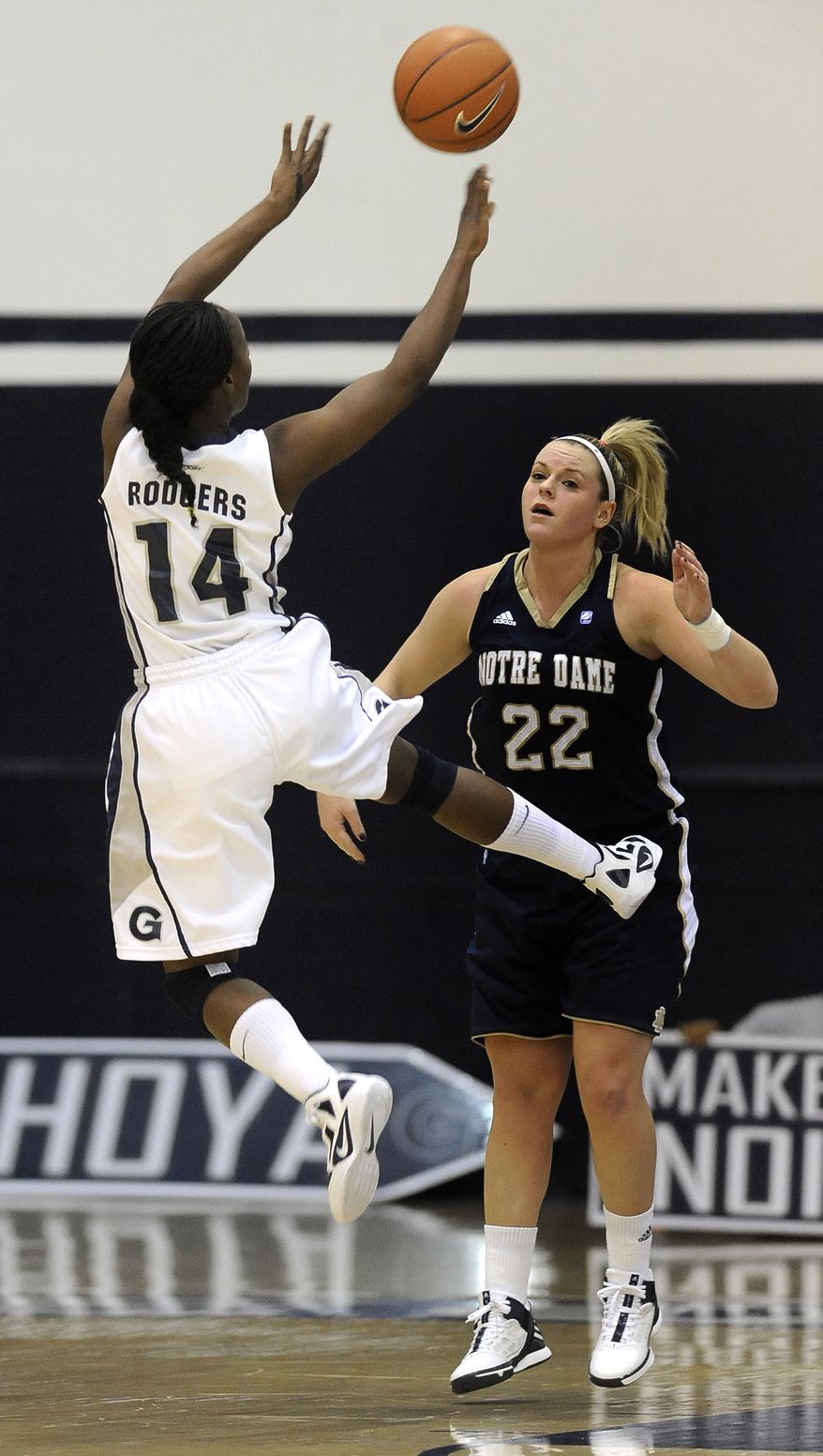 Georgetown's Sugar Rodgers goes up for a shot away from Notre Dame's Brittany Mallory (22) during second half of an NCAA basketball game, Tuesday, Jan. 10, 2012, in Washington. Notre Dame defeated Georgetown 80-60. (AP Photo/Richard Lipski)