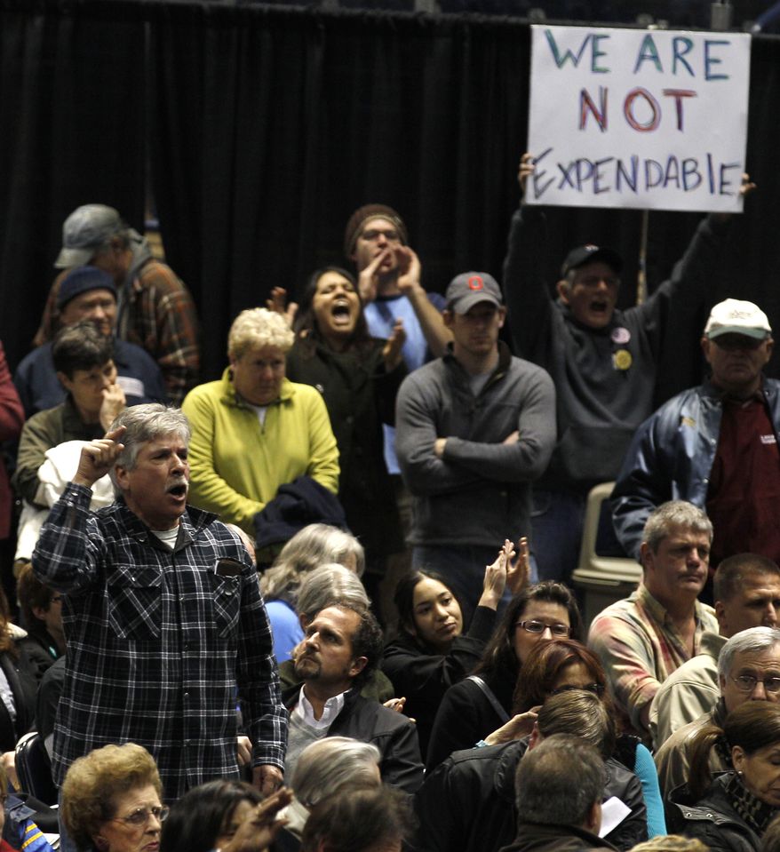 Citizens respond to speakers Jan. 11, 2012, during a community forum Youngstown, Ohio, to discuss recent seismic activity related to deep wastewater injection wells. (Associated Press)