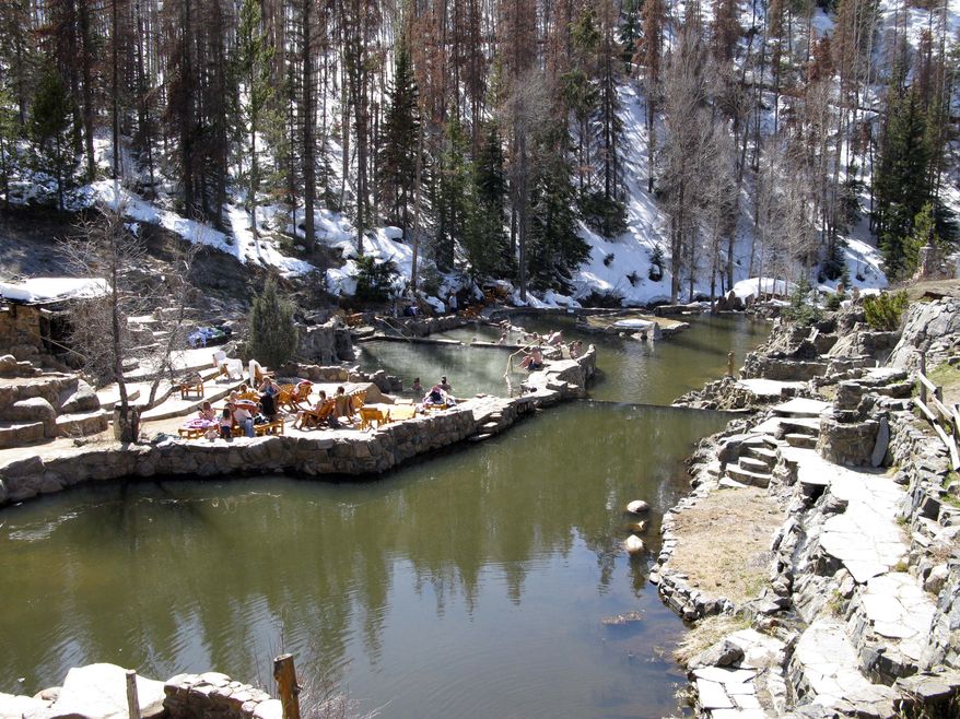 This March 2009 photo shows the Strawberry Park Hot Springs at Steamboat Springs, Colo. Steamboat Springs, located about 150 miles northwest of Denver, was named in the 1860s by French fur trappers who thought the mineral springs they heard sounded like a steamboat. (AP Photo/Karen Schwartz)