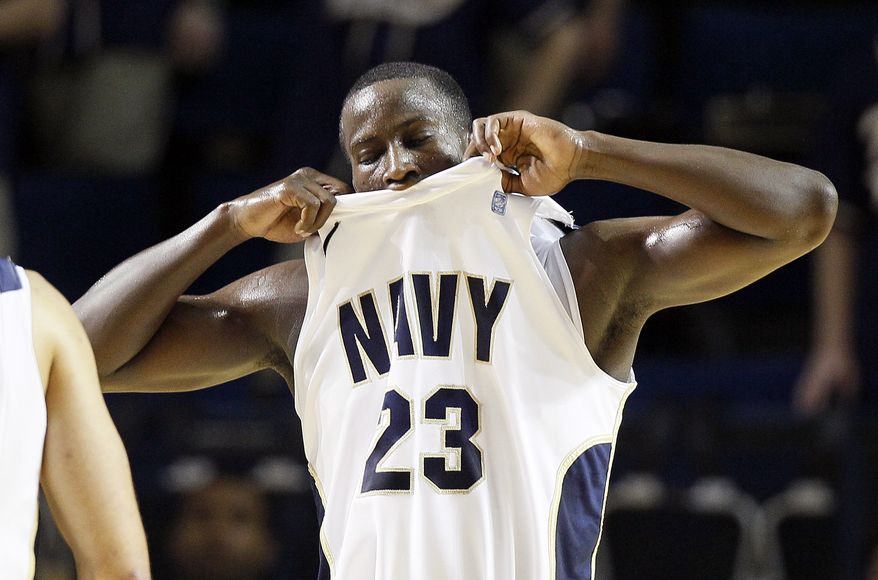 Navy guard Donya Jackson reacts after receiving an offensive foul call in the second half against Army in Annapolis, Md., Saturday, Jan. 14, 2012. Army won 75-62. (AP Photo/Patrick Semansky)