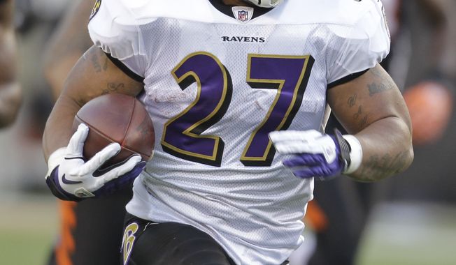 Baltimore Ravens running back Ray Rice had 1,364 yards and 12 touchdowns on the ground this season. (AP Photo/Darron Cummings)