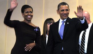 **FILE** President Obama and first lady Michelle Obama attend the Let Freedom Ring Celebration in honor of Dr. Martin Luther King at the Kennedy Center in Washington on Jan. 16, 2012. (Associated Press)