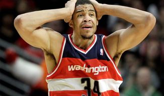 Center JaVale McGee is one Wizard whose decision-making has been called into question during Washington&#39;s 1-12 start to the season. (Associated Press)