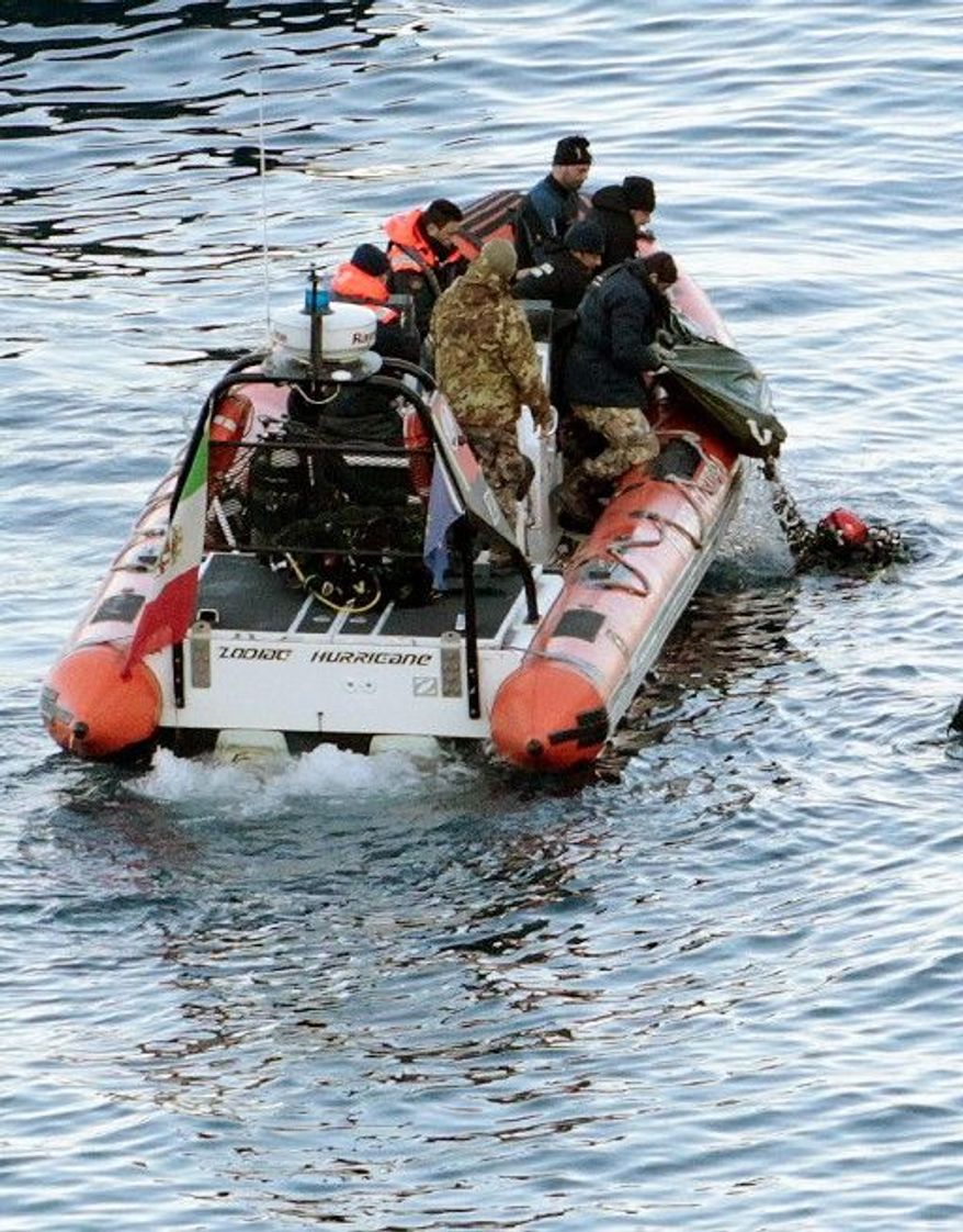 Italian divers recover one of five bodies Tuesday from the wrecked cruise ship Costa Concordia off the coast of Tuscany, raising the official death toll to 11. Teams have been searching the vessel for passengers and crew missing since the vacation liner foundered on rocks Friday evening. (Associated Press)