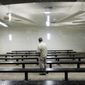 ** FILE ** A man waits to be processed at a Border Patrol detention center on Jan. 17, 2012, in Imperial Beach, Calif. (Associated Press)