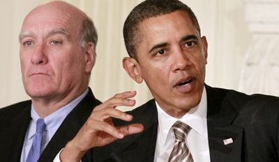 ** FILE ** President Obama sits with White House Chief of Staff Bill Daley while meeting with the Council on Jobs and Competitiveness on Jan. 17, 2012, in the State Dining Room of the White House. (Associated Press)
