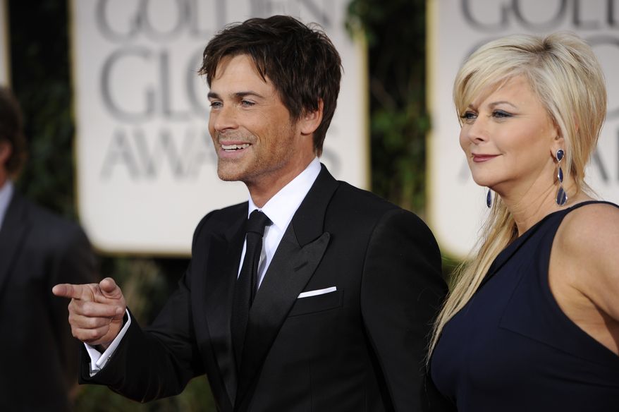 Rob Lowe and wife Sheryl arrive for the 69th Annual Golden Globe Awards Sunday, Jan. 15, 2012, in Los Angeles. (AP Photo/Chris Pizzello)