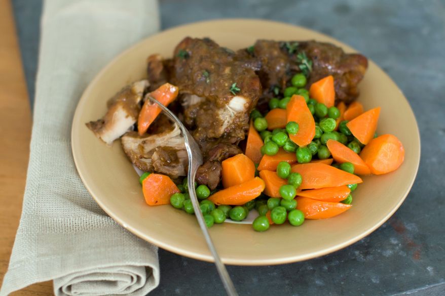 Cookbook author Rocco DiSpirito serves up his braised chicken with mushrooms and mustard, perfect for a hearty winter meal. It can be made in a slow cooker or in the oven. (Associated Press)