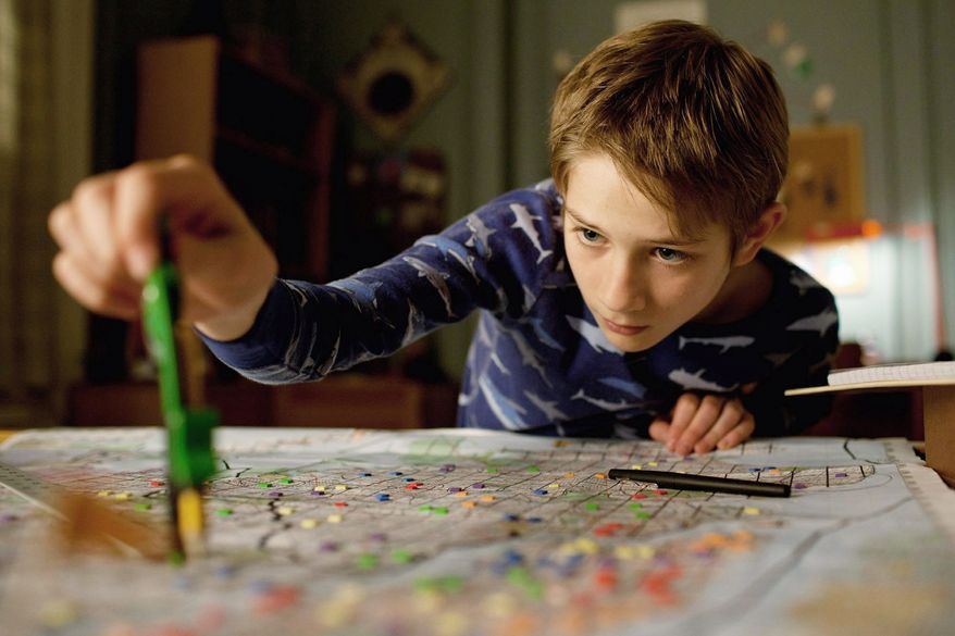 Thomas Horn as Oskar Schell hopes to find something to help him connect with the father he lost in the Sept. 11 attacks in "Extremely Loud & Incredibly Close." (Warner Bros. Pictures via Associated Press)