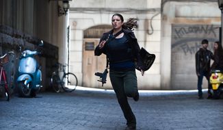 Gina Carano plays mercenary intelligence operative Mallory Kane in &quot;Haywire,&quot; the new action thriller from director Steven Soderbergh and writer Lem Dobbs. (Relativity Media via Associated Press)