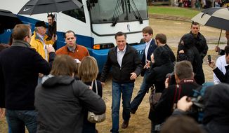 Republican presidential candidate and former Massachusetts Gov. Mitt Romney arrives Jan. 20, 2012, at a campaign rally at the Harmon Tree Farm in Gilbert, S.C. (Andrew Harnik/The Washington Times)