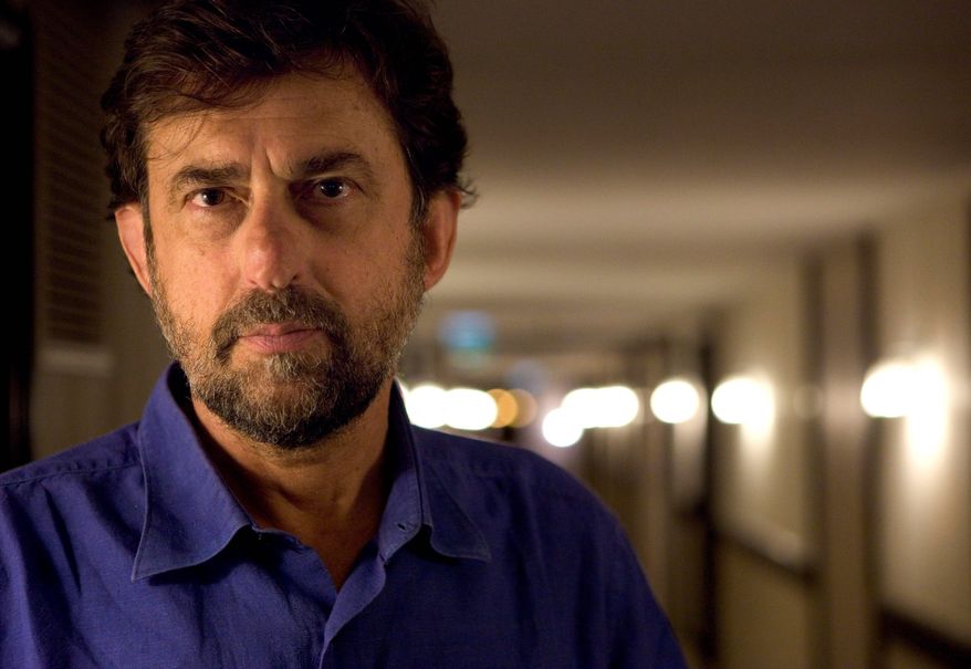 FILE - In this Saturday, May 14, 2011 file photo Italian satirical filmmaker Nanni Moretti poses for a portrait during promotion for Habemus Papam at the 64th international film festival, in Cannes, southern France. Organizers of the Cannes Film Festival have chosen satirical Italian filmmaker Nanni Moretti to head the jury at this year's festival. The veteran actor and director of 2001 Palme d'Or winner "The Son's Room" will head the jury for the May 16-27 festival on the French Riviera. (AP Photo/David Azia, File)