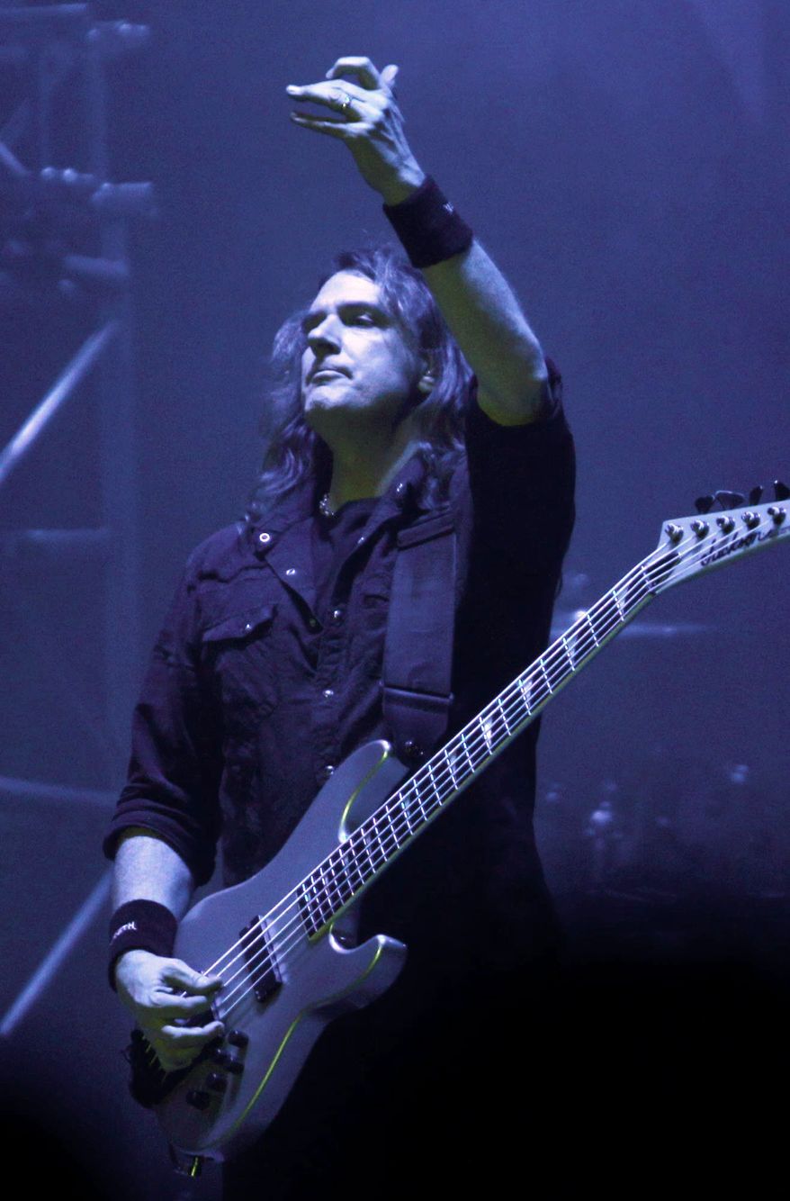 "I have a hand in both worlds. I love praise and worship music, and I love heavy metal," says Megadeth guitarist David Ellefson. (Associated Press)