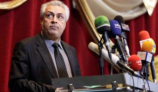 Iraqi Oil Minister Abdul-Karim Elaibi, OPEC&#x27;s acting president, said that while Iran&#x27;s &quot;enemies&quot; have imposed sanctions on the Islamic republic, OPEC&#x27;s focus should be protecting its members&#x27; interest and not being dragged into a political struggle. (Associated Press)