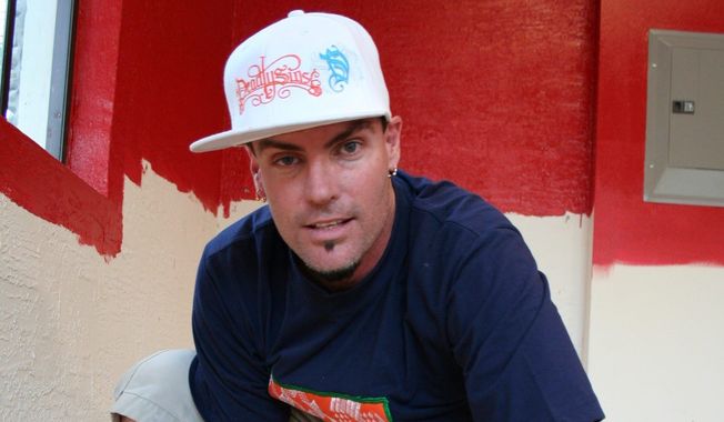 Rob Van Winkle, also know as Vanilla Ice, lays flooring in the garage of a home he&#x27;s remodeling in Wellington, Fla. After his early 1990 stardom faded, he became involved in real estate. He is starting in &quot;The Vanilla Ice Project&quot; a home renovation show, where the expert just happens to be Vanilla Ice. (Associated Press)