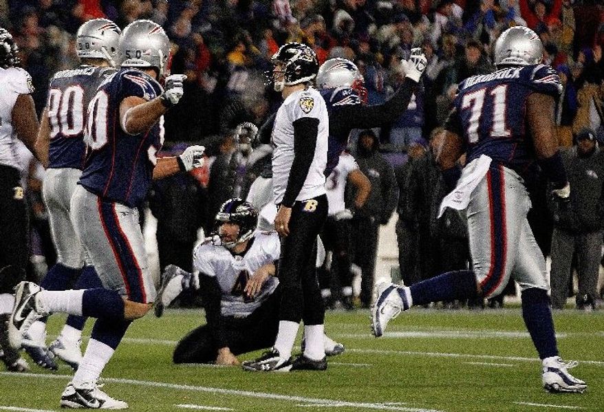 Baltimore kicker Billy Cundiff (center) could have forced overtime at New England in the AFC title game Sunday, but his 32-yard field goal attempt in the waning seconds was wide left. (Associated Press)