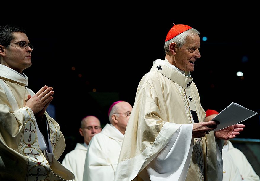Donald W. Wuerl, the archbishop of Washington, celebrates Mass at Verizon Center on Monday as part of the March for Life festivities. (Barbara L. Salisbury/The Washington Times)