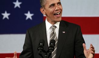 President Obama sings before speaking at a campaign event at the Apollo Theater in the Harlem neighborhood of New York on Jan. 19, 2012. (Associated Press)