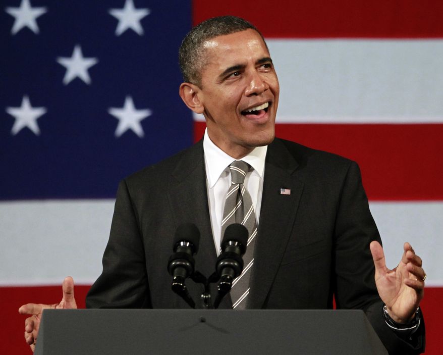 President Obama sings before speaking at a campaign event at the Apollo Theater in the Harlem neighborhood of New York on Jan. 19, 2012. (Associated Press)