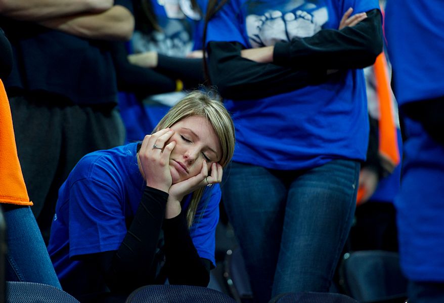 Fifteen-year-old Sydney Bosman of Huntingtown, Md., takes a nap during the Youth Rally and Mass for Life. (Barbara L. Salisbury/The Washington Times)