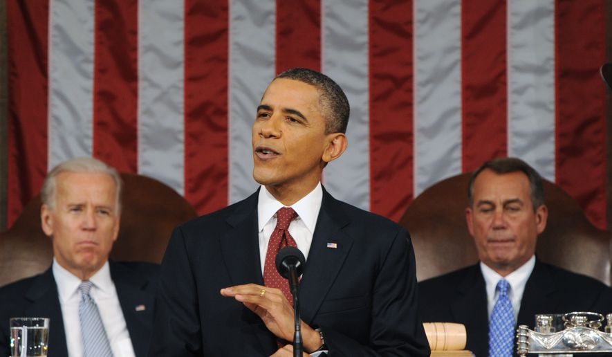 President Barack Obama delivers his State of the Union address on Capitol Hill in Washington, Tuesday, Jan. 24, 2012. Listening in back are Vice President Joe Biden and House Speaker John Boehner, right. (AP Photo/Saul Loeb, Pool)