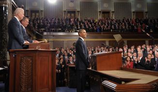 President Barack Obama pauses before he delivers his State of the Union address on Capitol Hill. At left are Vice President Joe Biden and House Speaker John Boehner. (AP Photo/Saul Loeb, Pool)