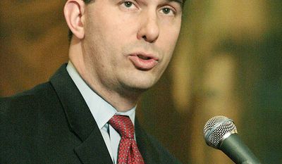 Wisconsin Gov. Scott Walker has a 51 percent approval rating, according to a Marquette University Law School poll, as he faces a recall effort. (Associated Press)