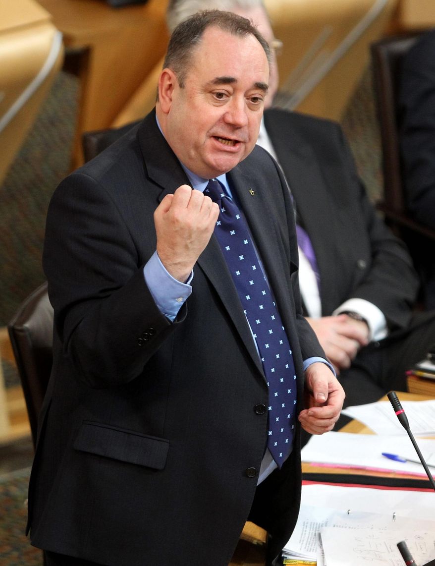 Scotland's First Minister Alex Salmond makes a statement to the Scottish Parliament in Edinburgh, outlining the referendum consultation Wednesday Jan. 25, 2012. Salmond announced the Scottish government's preferred options for the vote on whether to sever ties from Britain, which it plans to hold in the fall of 2014. (AP Photo/ Andrew Milligan/PA)