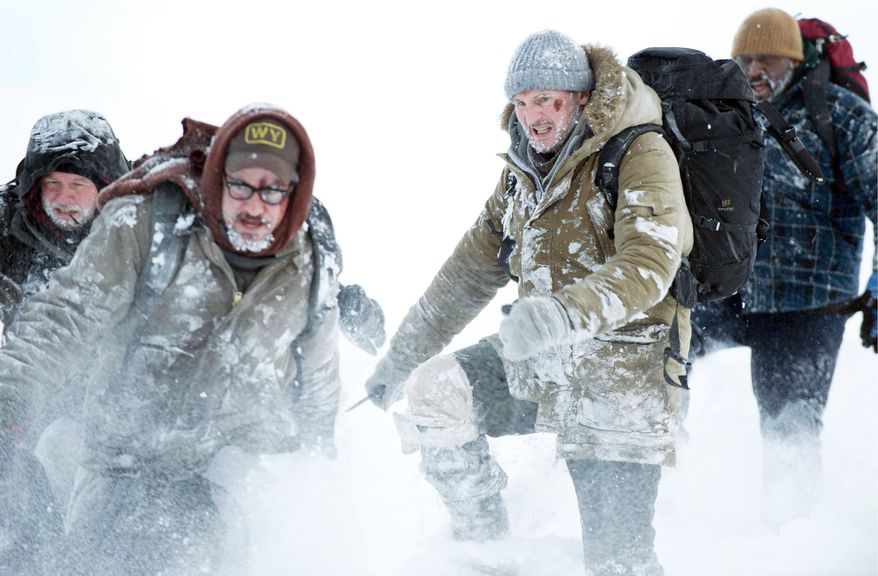 Dallas Roberts (from left), Dermot Mulroney, Liam Neeson and Nonso Anozie star in "The Grey," a story about beastly challenges of survival. (Associated Press)