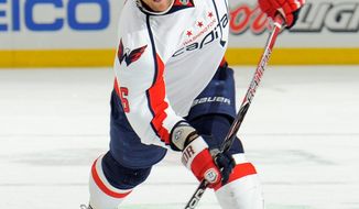 Capitals defenseman Dennis Wideman played 20:27 and had an assist in his first NHL All-Star Game. His team, Team Chara, won 12-9 over Team Alfredsson. (Associated Press)