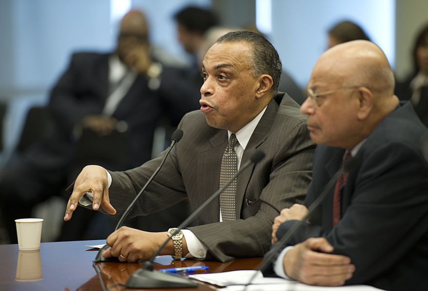 Inspector General Charles Willoughby answers questions regarding his office's report during the public oversight hearing Thursday, Jan. 26, 2012, on the matter of i-Gaming at the Wilson Building in Washington, D.C. That report called into question the legitimacy of the RFP process that the city engaged in to get bids for online gaming. (Barbara L. Salisbury/The Washington Times)