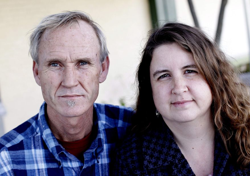 Dan and Vicki McCuistion of Driftwood, Texas, are seen Wednesday, Jan. 18, 2012, in Austin, Texas. The McCuistions have been uninsured throughout their 17 years married. (AP Photo/Eric Gay)