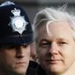 Julian Assange (right), the 40-year-old founder of WikiLeaks, arrives at the Supreme Court in London on Wednesday, Feb. 1, 2012, for a hearing in his extradition case. (AP Photo/Kirsty Wigglesworth)