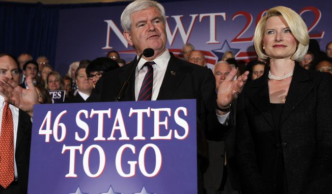 Republican presidential candidate and former House Speaker Newt Gingrich, accompanied by his wife, Callista, speaks Jan. 31, 2012, during a Florida Republican presidential primary night rally in Orlando, Fla. (Associated Press)