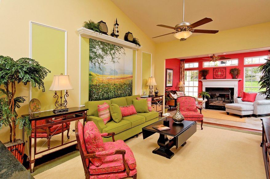 The spacious great room in the Pebble Beach model has a sloped ceiling. Buyers can add a sunroom and a fireplace off the great room. The model has 2,023 finished square feet.