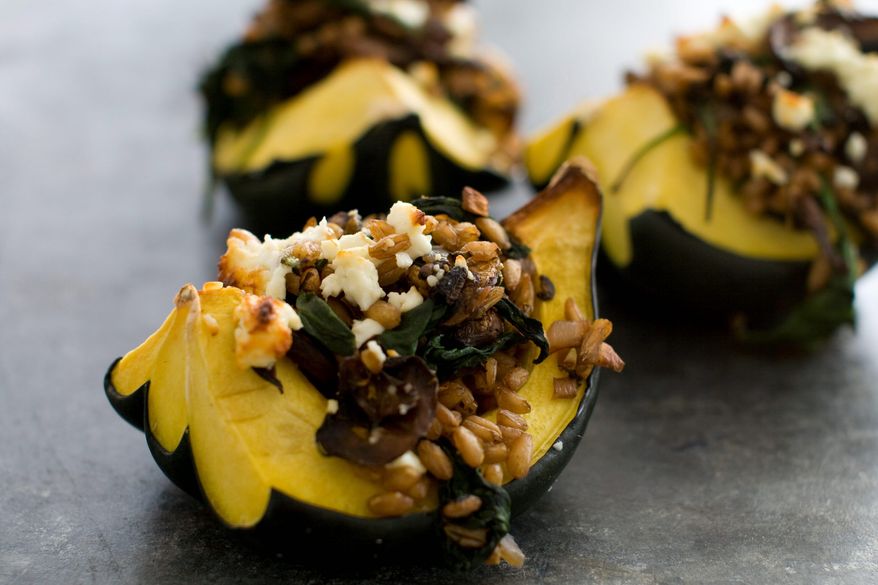Farro-and-mushroom-stuffed acorn squash is a one-dish meal rich in savory flavors thanks to a blend of meat, mushrooms and cheese. Plenty of fiber ensures the dish is both substantial and healthy. (Associated Press)