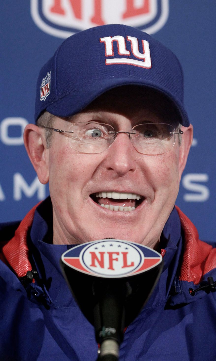 "It's still us against the world, and that's how we play that, period," Giants coach Tom Coughlin said Thursday. (Associated Press)