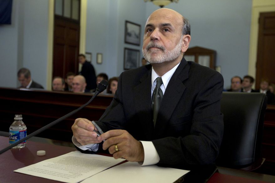 Federal Reserve Chairman Ben S. Bernanke testifies on Capitol Hill before the House Budget Committee on Thursday, Feb. 2, 2012, in Washington. (AP Photo/Carolyn Kaster)