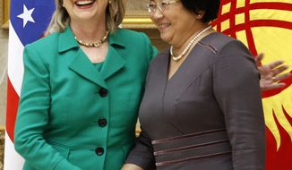 **FILE** Secretary of State Hillary Rodham Clinton (left) meets with Kyrgyzstan President Roza Otunbayeva in Bishkek on Dec. 2, 2010. (Associated Press)