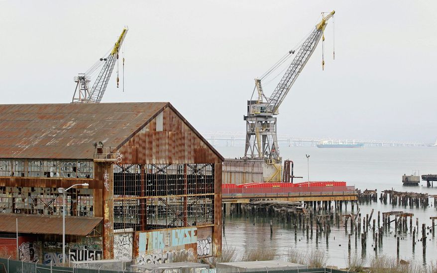 Residents of San Francisco's Dogpatch neighborhood near Pier 70 are passionate about the 150-year-old industrial buildings, canneries, drydocks and maritime lore. The city, which sees economic potential in a commercial revival, promises that most of the historic buildings will not be razed and that new structures will integrate nicely. Still, residents are concerned that "frou-frou upscale stuff" will change their lifestyles. (Associated Press)