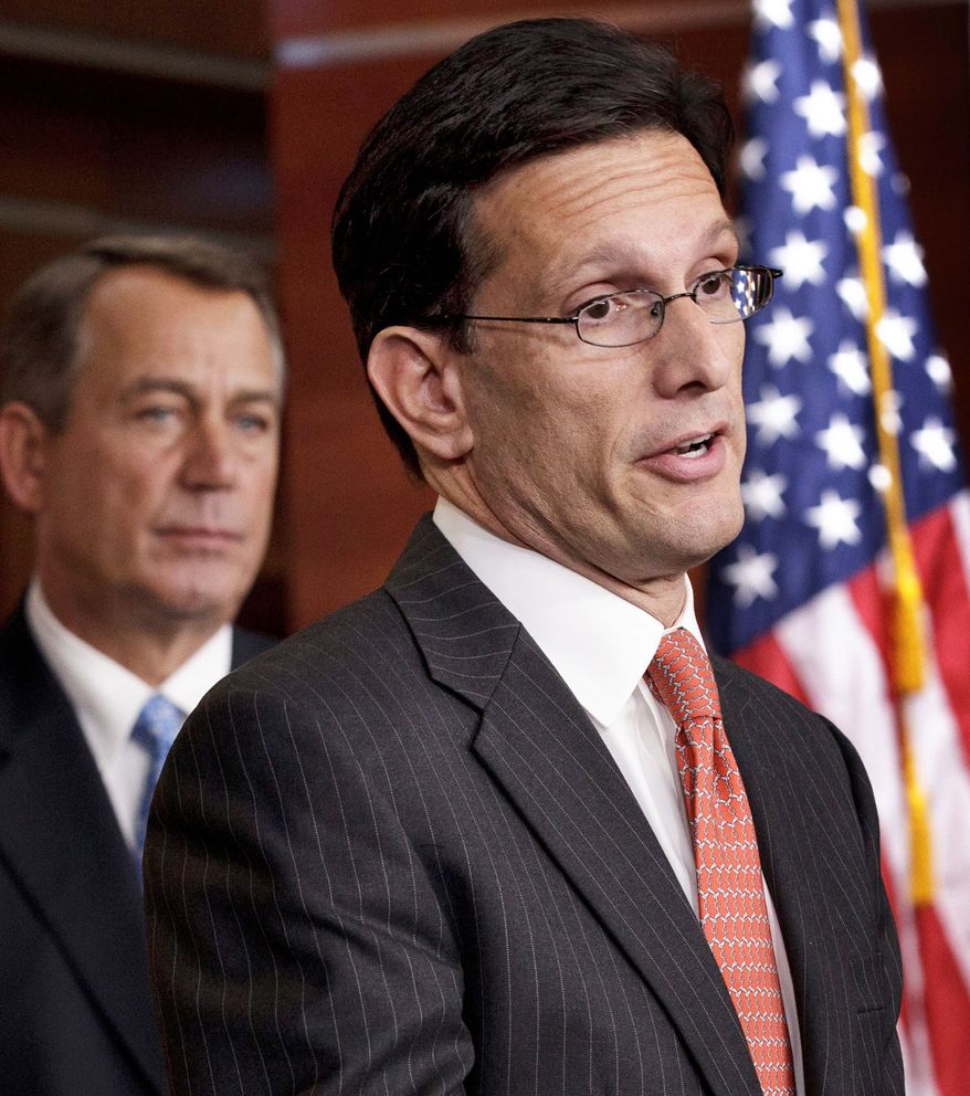 House Majority Leader Eric Cantor, Virginia Republican (right), promises to take swift action on the Stop Trading on Congressional Knowledge Act. He prefers the Senate bill over a narrower House version. Both bills explicitly ban insider trading. At left is House Speaker John A. Boehner, Ohio Republican. (Associated Press)
