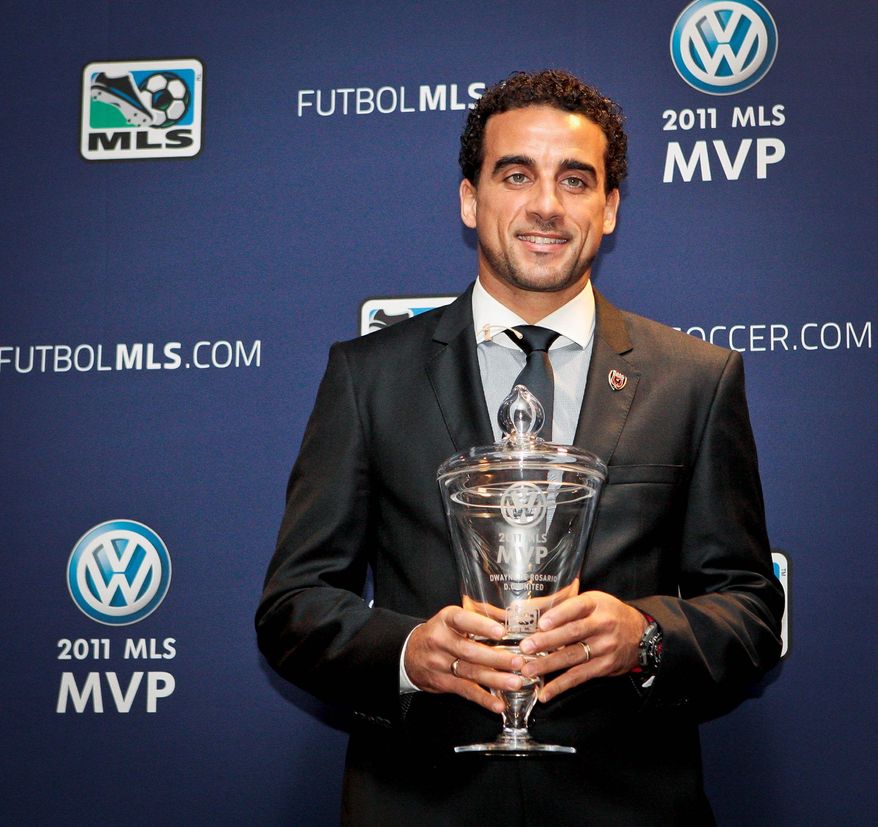 Major League Soccer MVP Dwayne De Rosario and United are negotiating a contract that would keep the forward in D.C. beyond this season. (Associated Press)